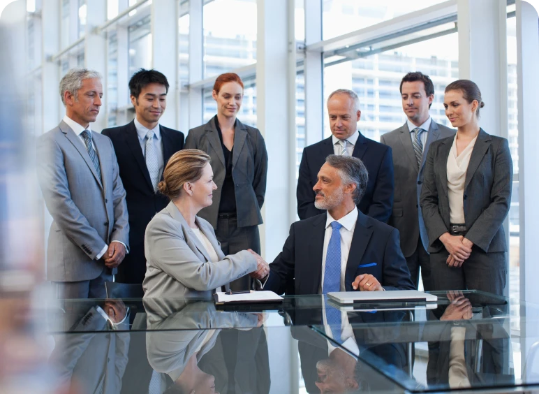 Professional handshake in modern office setting